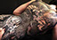 oriental dragon back piece cover-up black ink tattooed women