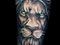 Lion head black and grey tattoo fore arm